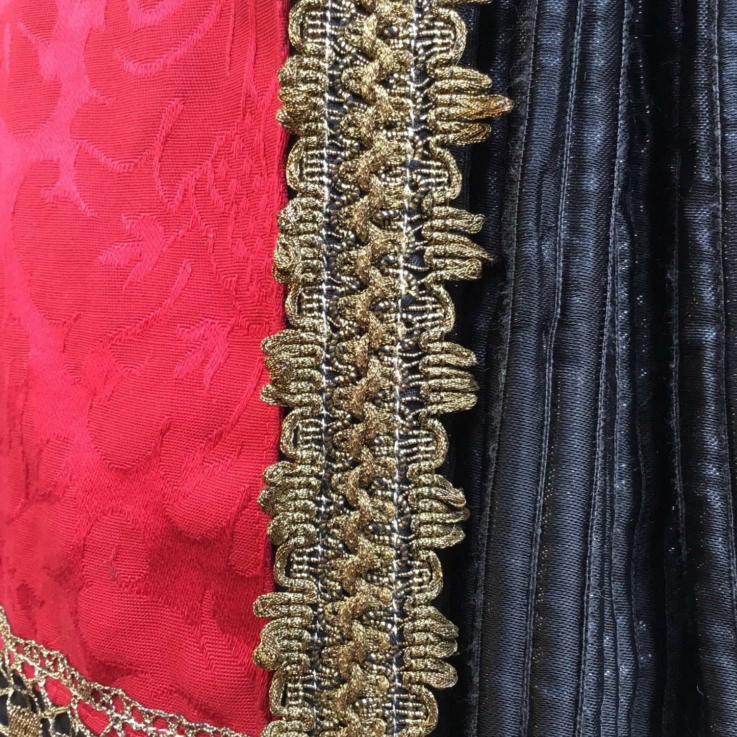 red textile with Gold Metallic Trim edge on black background - Splendid Vintage World