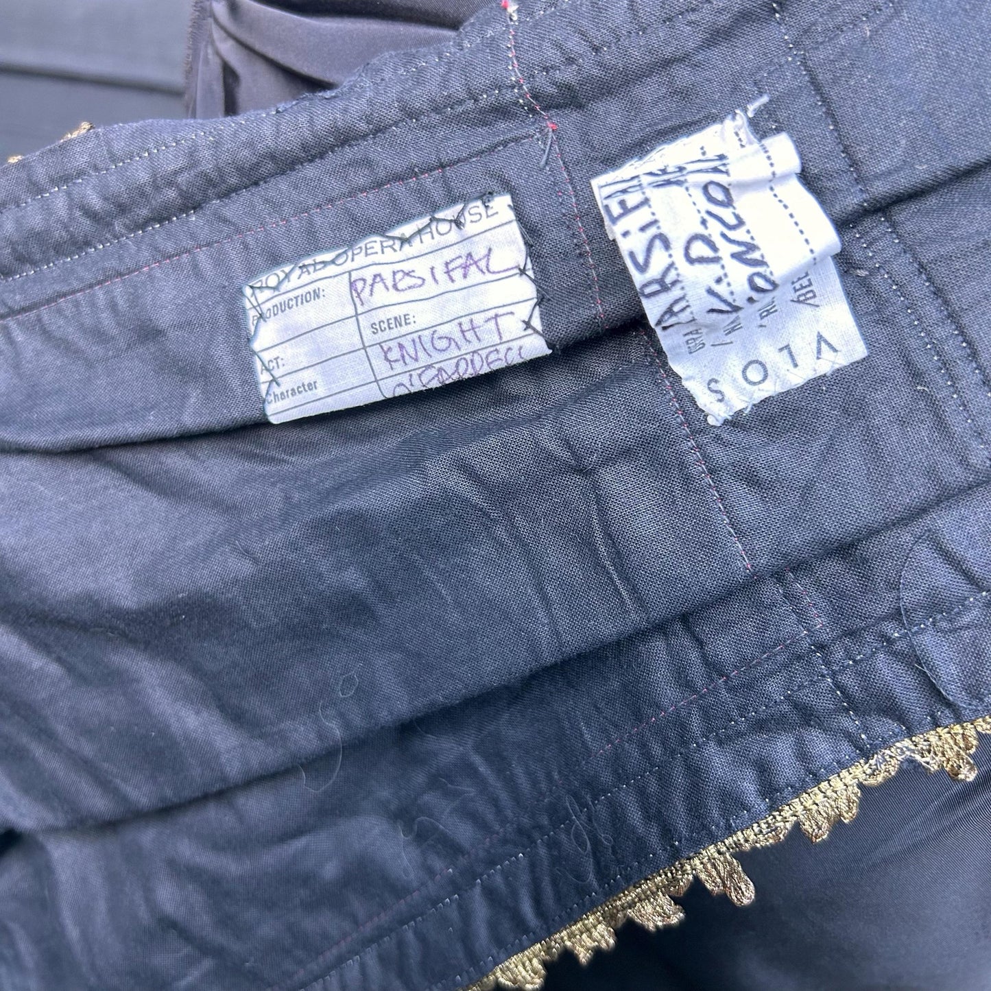 black pleated textile with Gold Metallic Trim edge with royal opera house Covent Garden & VLOS label - Splendid Vintage World