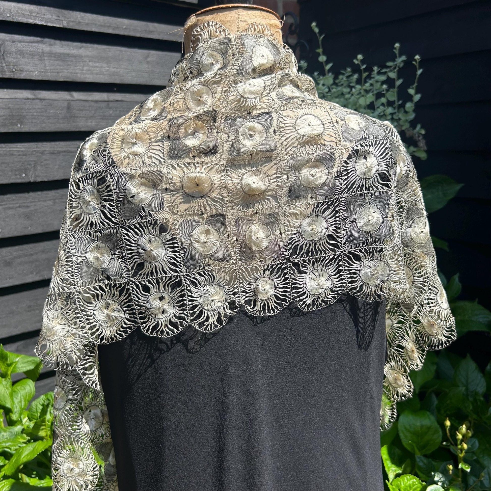 vintage silk Tenerife floral lace stole in ivory & black on a mannequin in a black dress